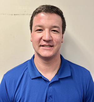 young man in a blue shirt